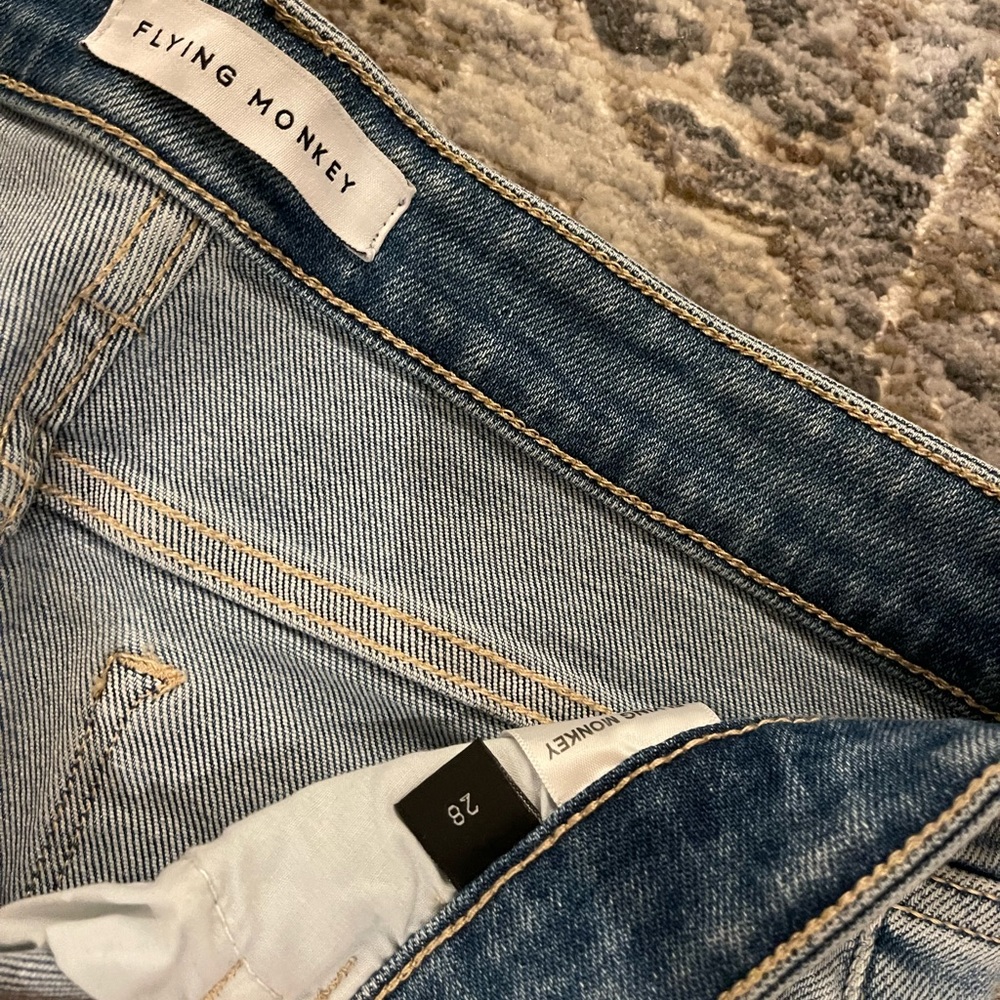 Denim jeans never worn flying monkey long 31 length approximately fits a size 6